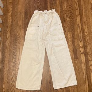 Cream wide legged jeans